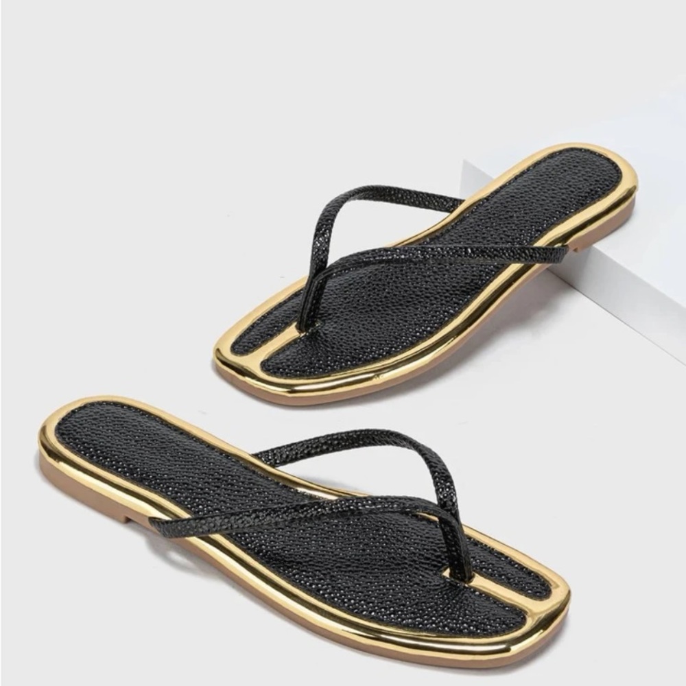 Black sandal gold accents. Worn once. Sturdy.